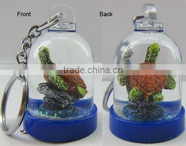 Fish snow globe used as plastic key chain