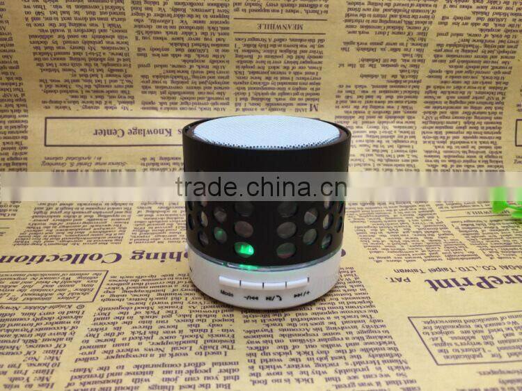 Round hole wireless Small mobile phone bluetooth speakers subwoofer TF card speaker hands-free speaker with LED FM