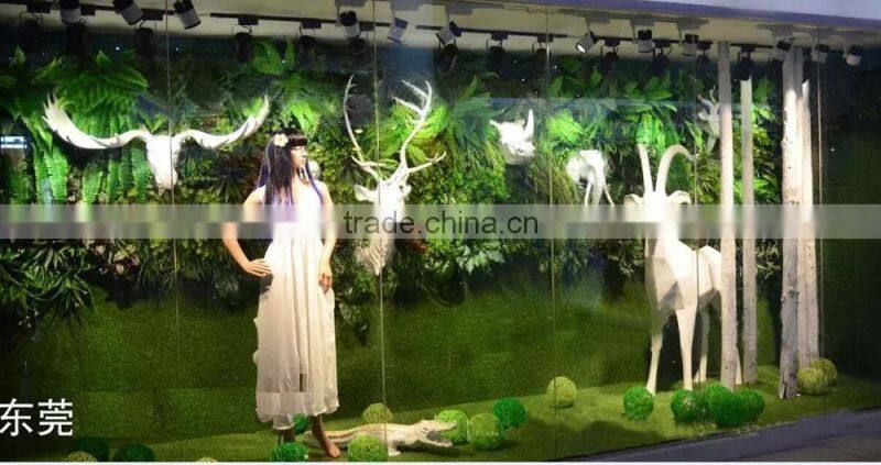 Fashion artificial grass plants store design wall