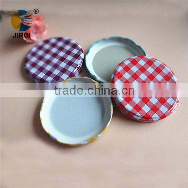 blue colour metal screw cap with white knots