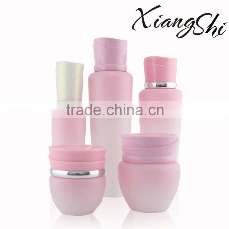 pink color cosmetic creams jar and bottle packaging