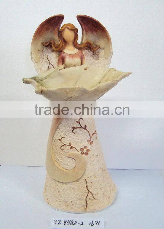 Resin fairy with a snail statue sculpture