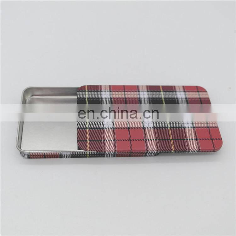 Flat sliding tin candy packaging case with embossing