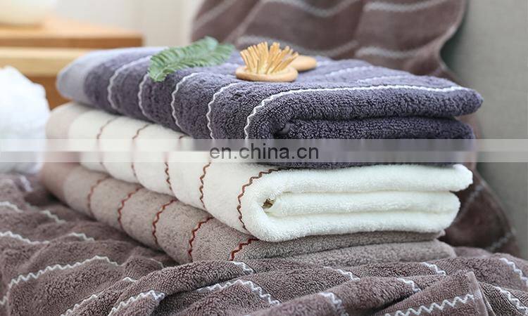 Yiwu factory high quality cozy textile water ripple design jacquard textile bath towel 70x140CM