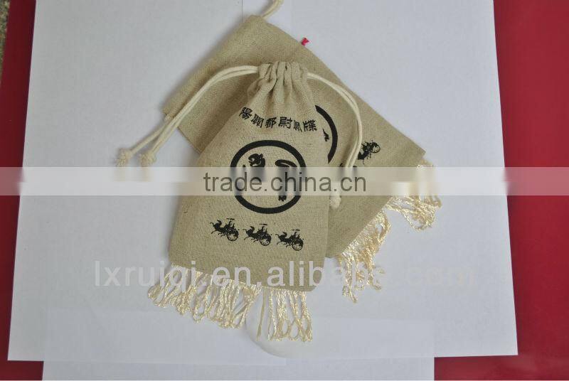 yiwu market cheap jute bag ,drawstring jute packing bags with tassel,promotion pouch