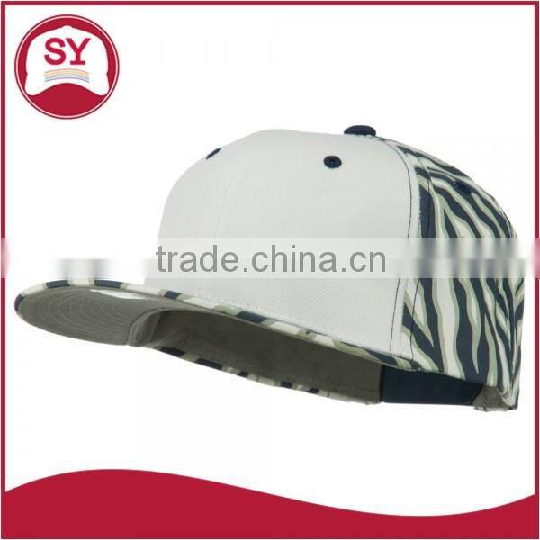 Short brim snapback hat with an adjustable plastic snapback strap closure