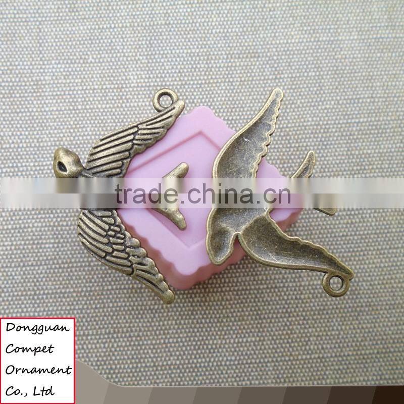 Zinc alloy jewelry accessories Flying swallow bird pendant
