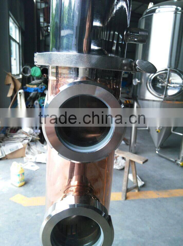 reflux tower still with a six window tower and milk tank bottom