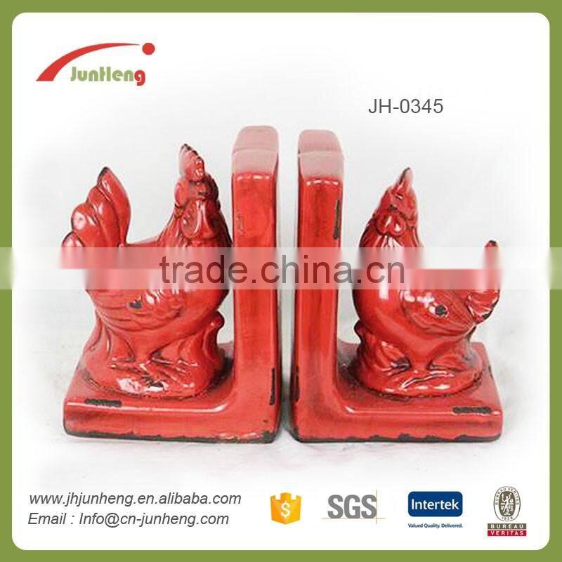 glazed red ceramic book holder stand, cock double for bookends