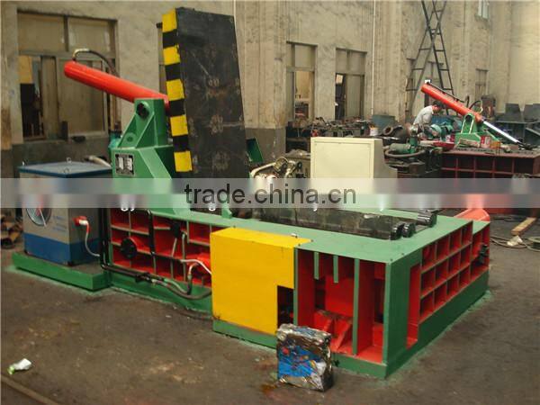 Horizontal baler with manual belting