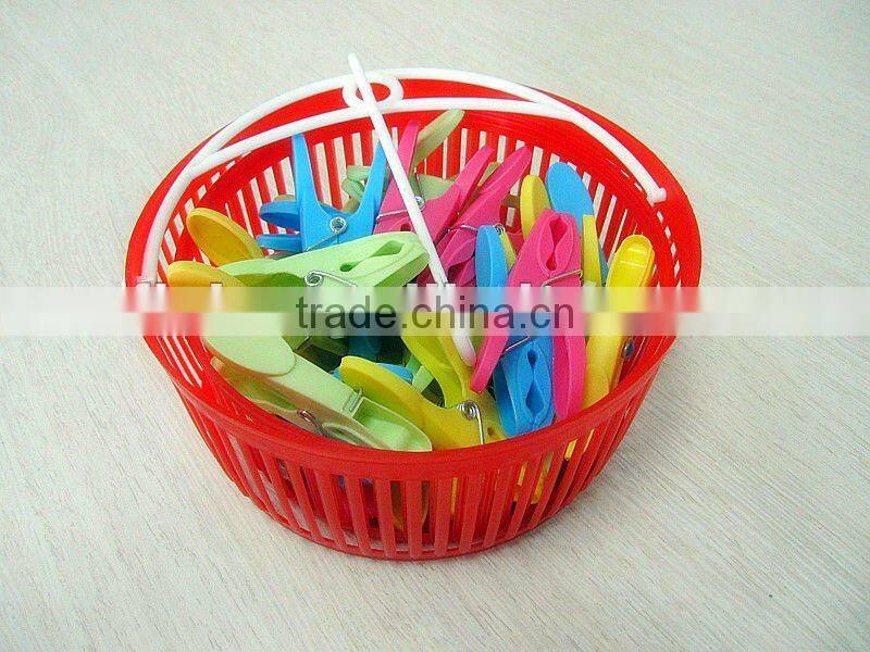 New foldable plastic basket with colorful clothes pegs