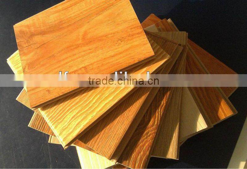 Synchronized high gloss laminated wood flooring
