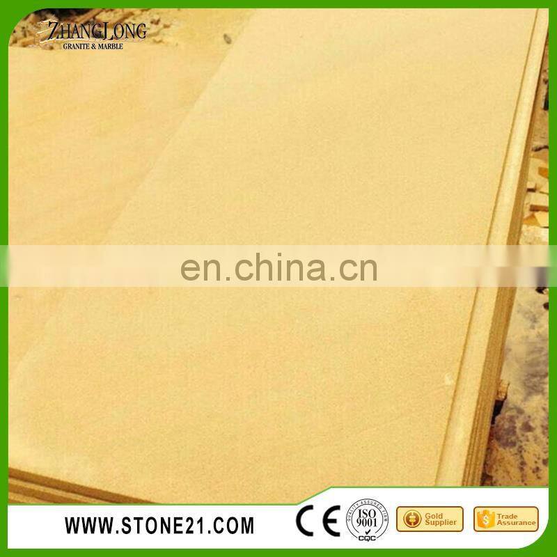 sandstone cladding, rusty yellow sandstone