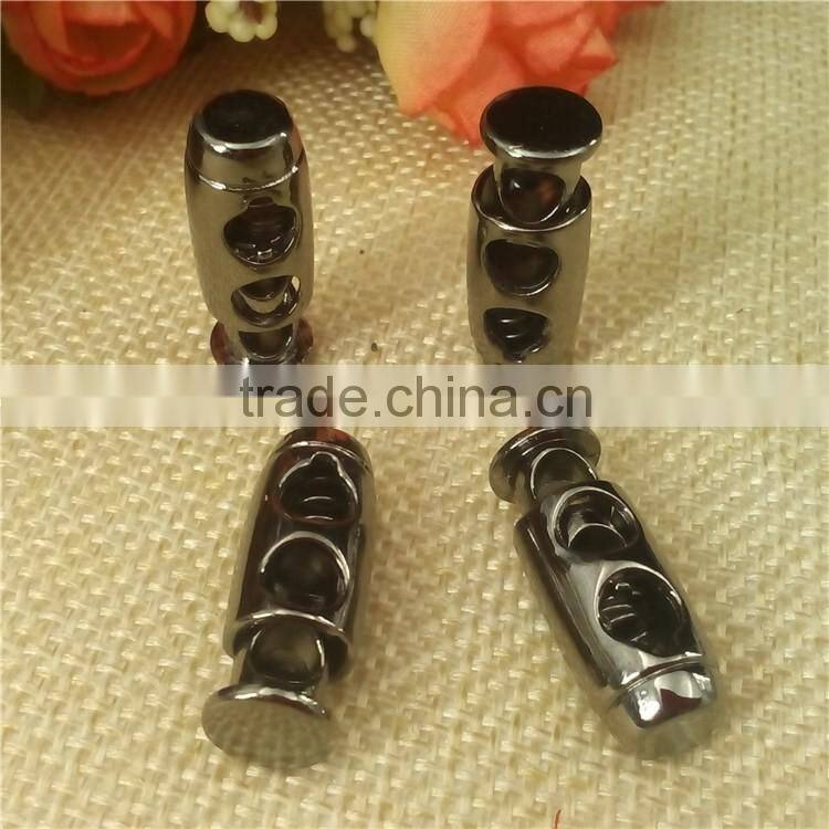 two hole stoppers spring clothing stopper metal spring stopper