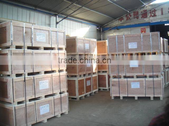 rectangular freestanding cast iron bathtub with wooden cradle