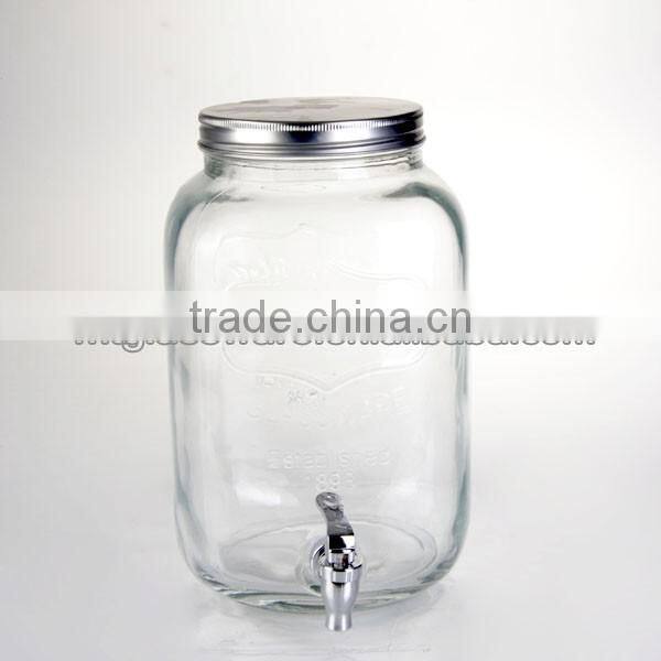 huge glass mason jar with a tap
