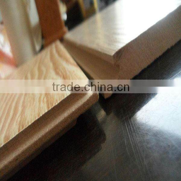 Synchronized high gloss laminated wood flooring