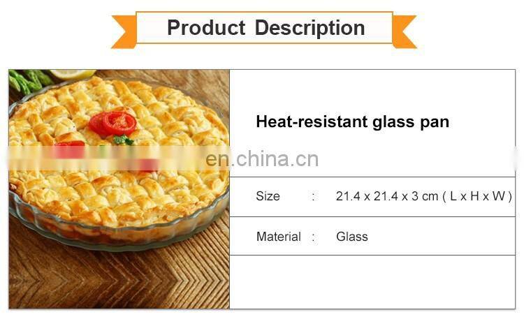 A Round Of Heat Resistant Glass Pizza Baking Dish