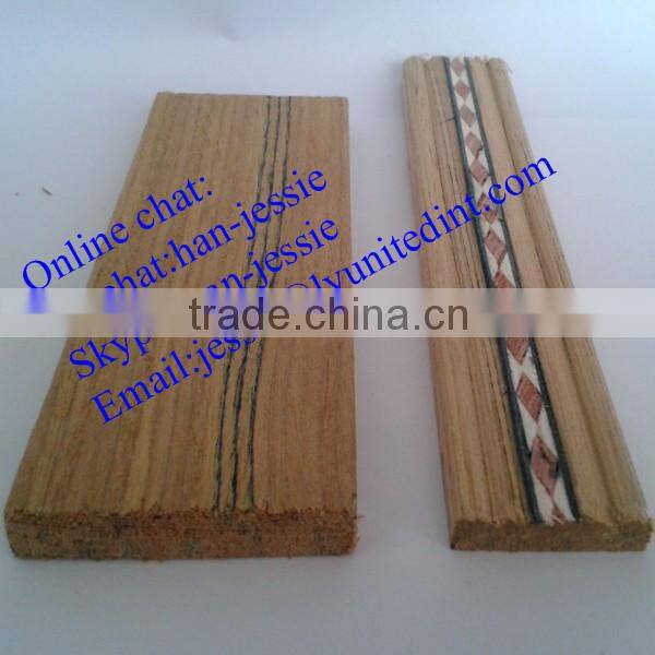 unpainted wood baseboard