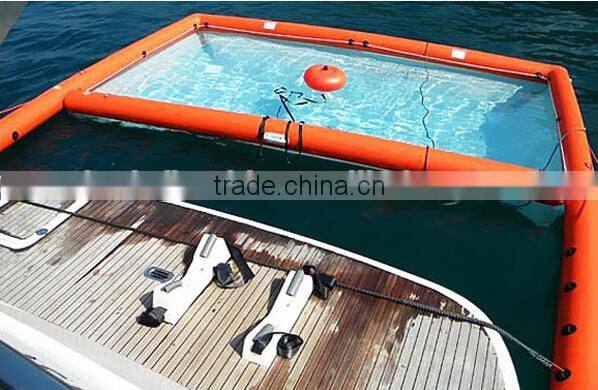 inflatable swimming pool floating on water deployed
