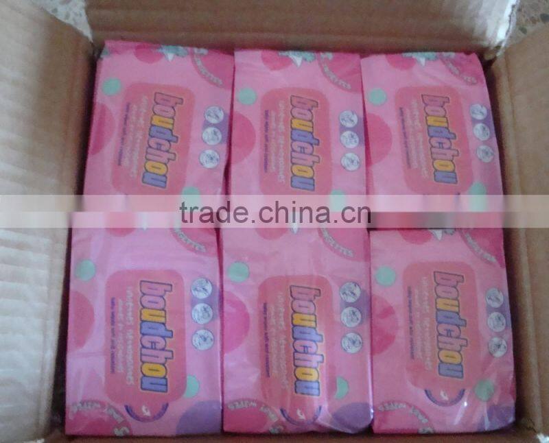 lady wipes hand wet wipes