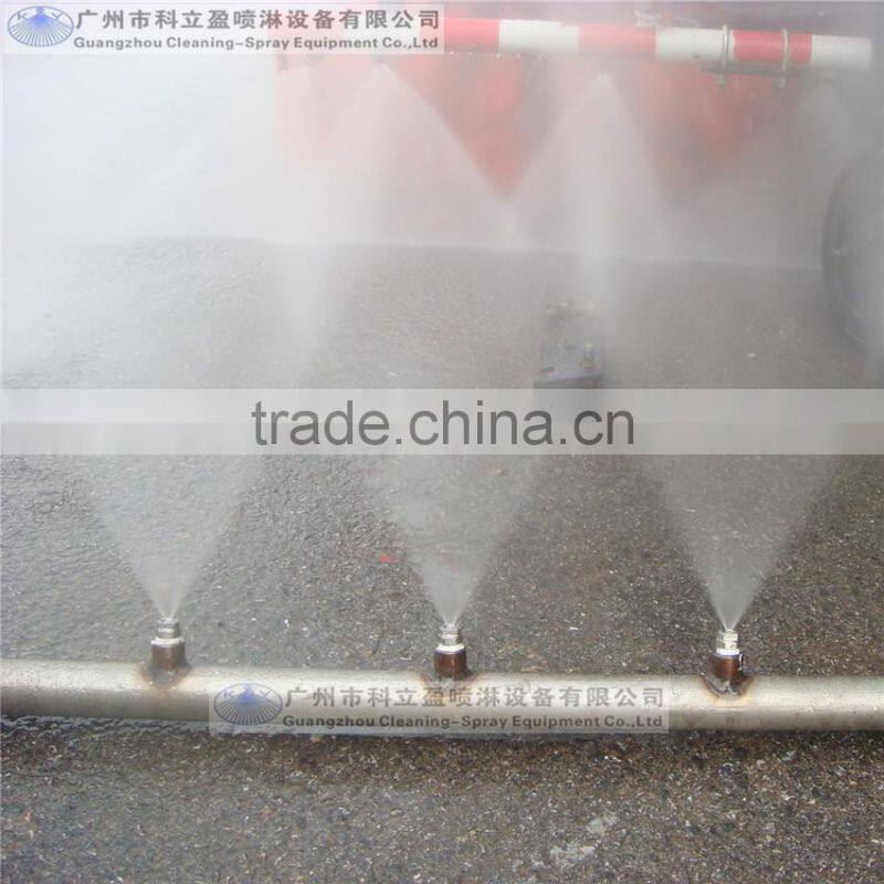 Sweeper truck spray nozzles for cleaning