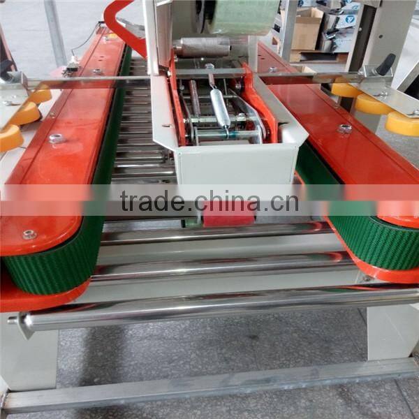 Automatic box sealing machine, automatic carton box sealing machine, carton box packing machine