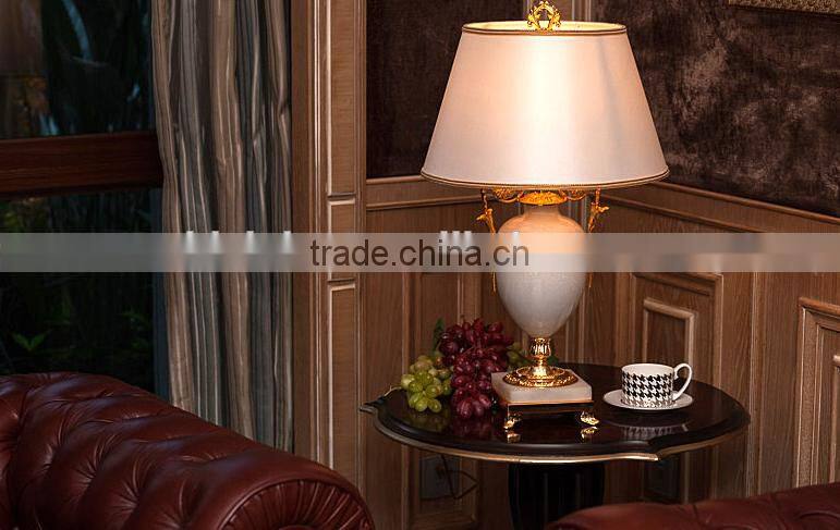 Graceful white color jade body brass bottom home use table lamp with fabric lampshade