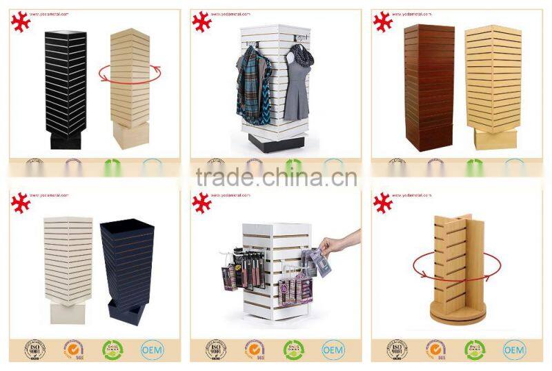 revolving wooden slatwall display with spinner rotating