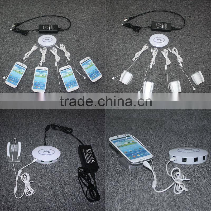 Novelty pop alarm security multiple handset holder