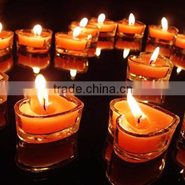 Hand made heart shaped thick wall and round in center clear and red votive candle holder