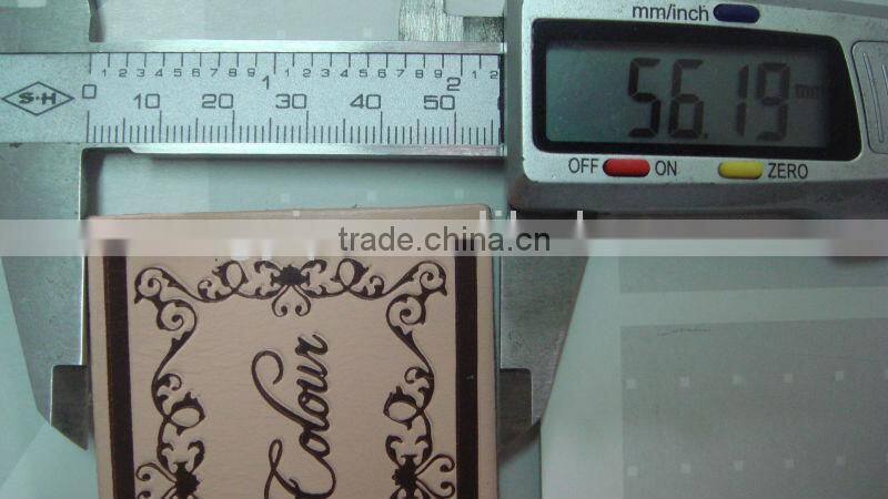 engraved decorate garment brown leather patch