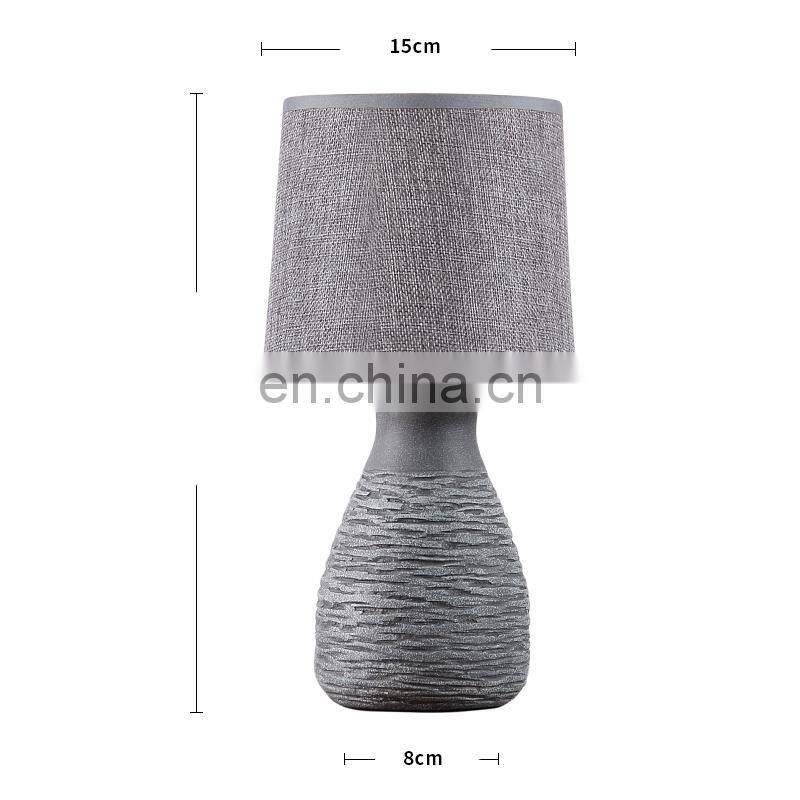 antique ceramic meterial beside table lamp