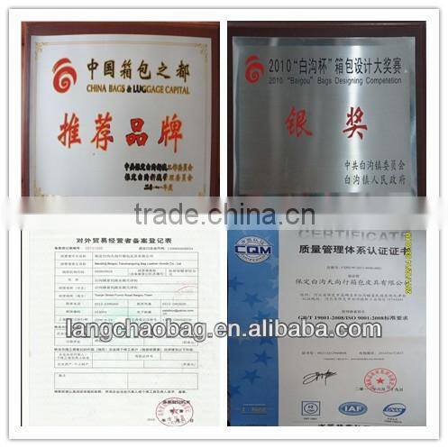 red brown crocodile trolley duffle bag