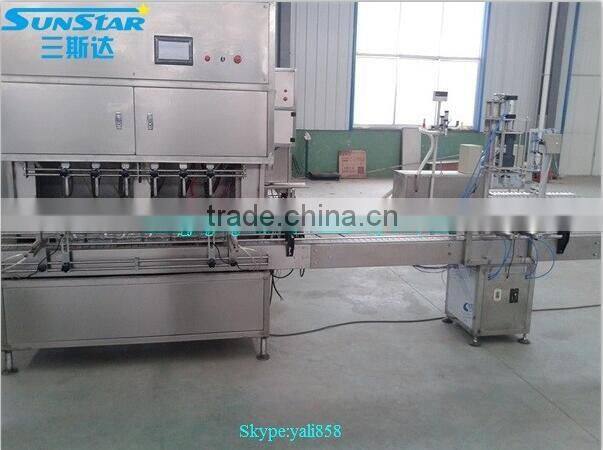 Automatic linear type grease filling machine for olive cooking sunflower oil in bottle barrel or jar can