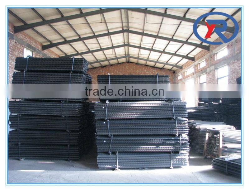 Black bituminous coated Y fence post punched with teeth