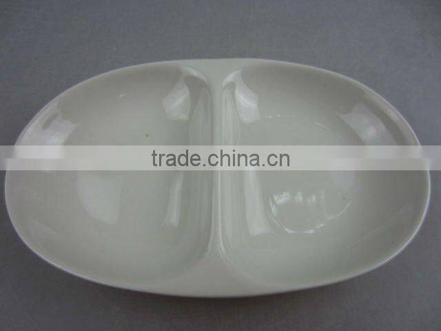 Stock white porcelain two division oval sauce dish