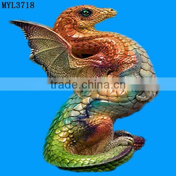 Resin hatching from egg baby dragon statuette