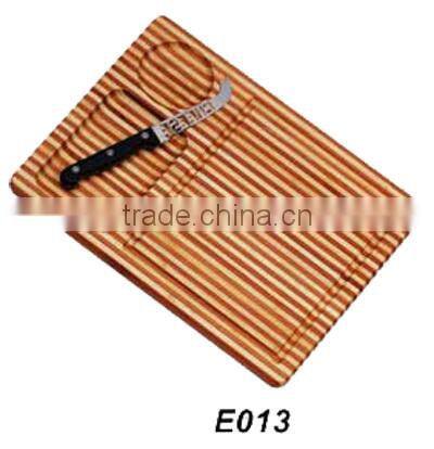 bamboo cutting board with knife