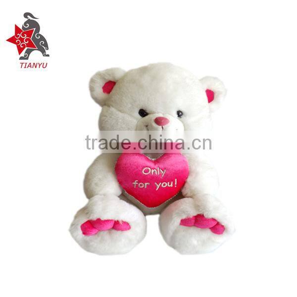 Stuffed soft plush bear with love heart