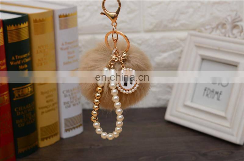 2021 Wholesale custom luxury fur ball key holder Pearl keychains pom pom bow keychain for women bag good quality