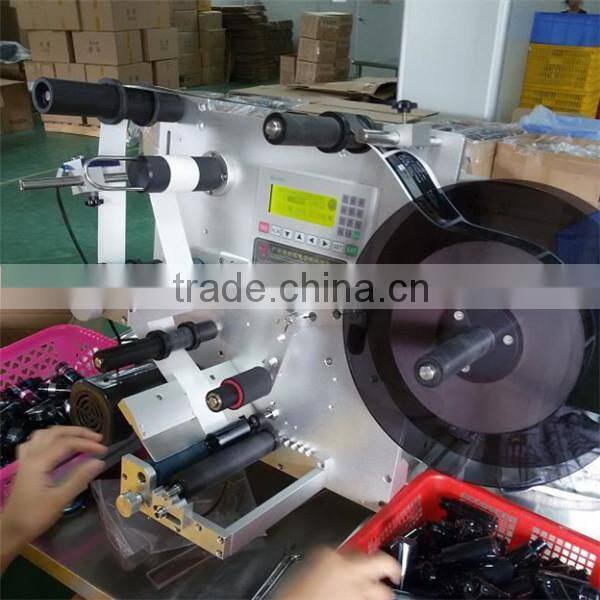2015 Guangzhou semi-automatic multifunctional round bottle labeling machine with PLC control