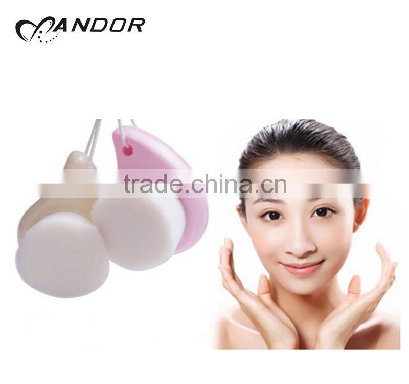 Patent design pink handle andor face cleansing brush