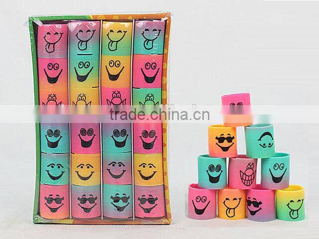 hot sale colorful magic rainbow spring with funny face kids educational toys/ plastic rainbow circle