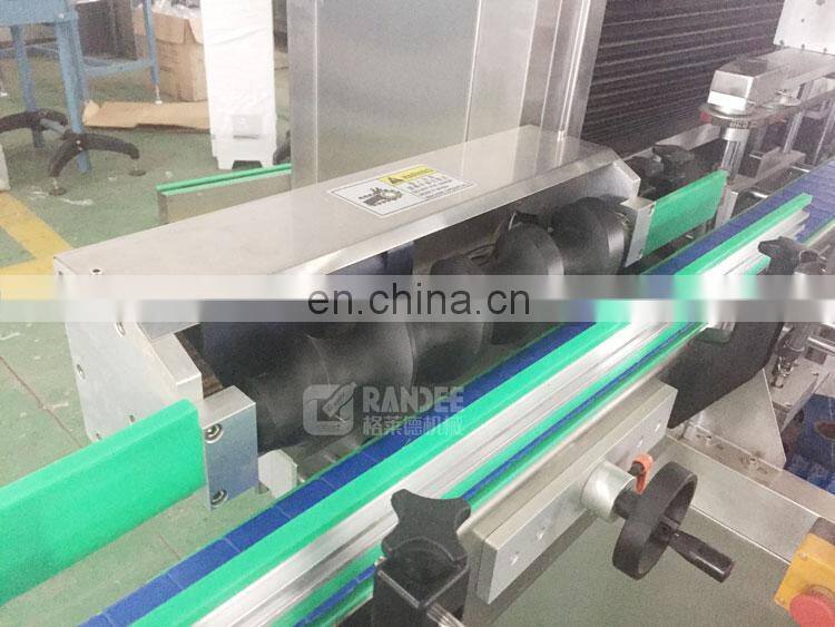 Automatic double head heat shrink sleeve label labeling machine for cup jelly