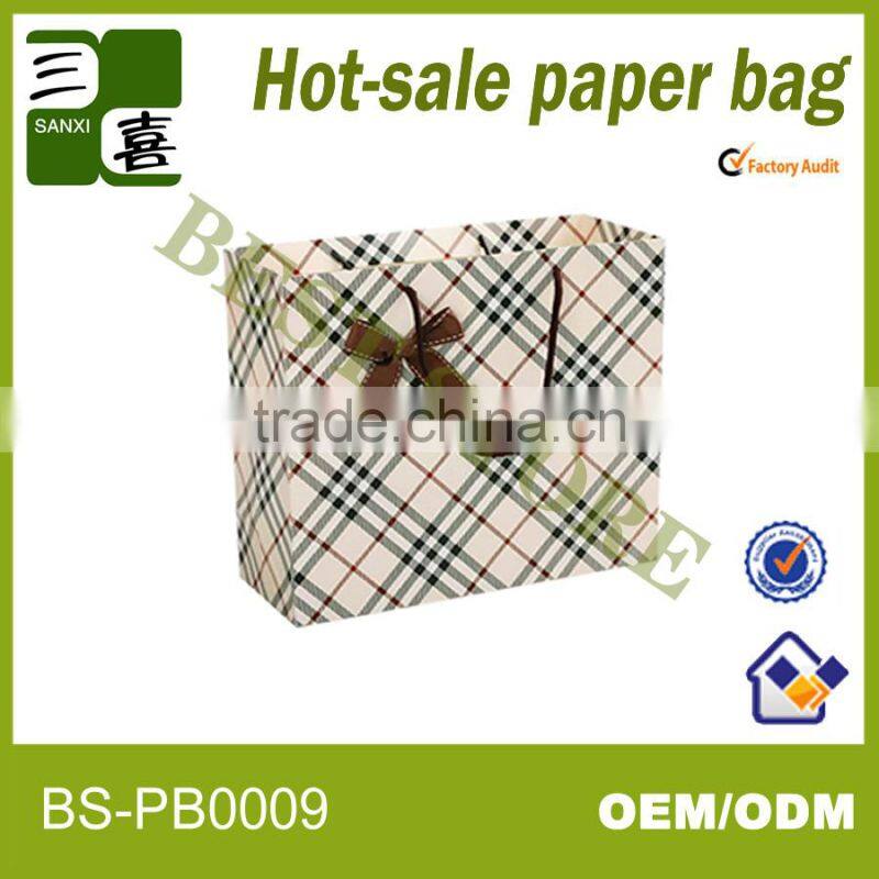 Glossy paper gift carry bag with ribbon rope