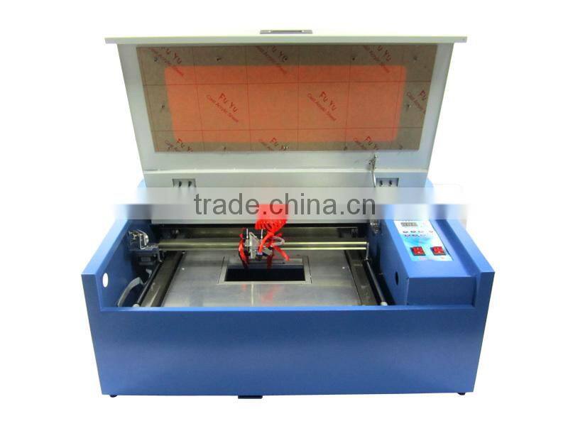 Best rotary axis LY 3040 CO2 laser cutting machine price with 50W tube ,1 year Warranty laser engraving machine for sale