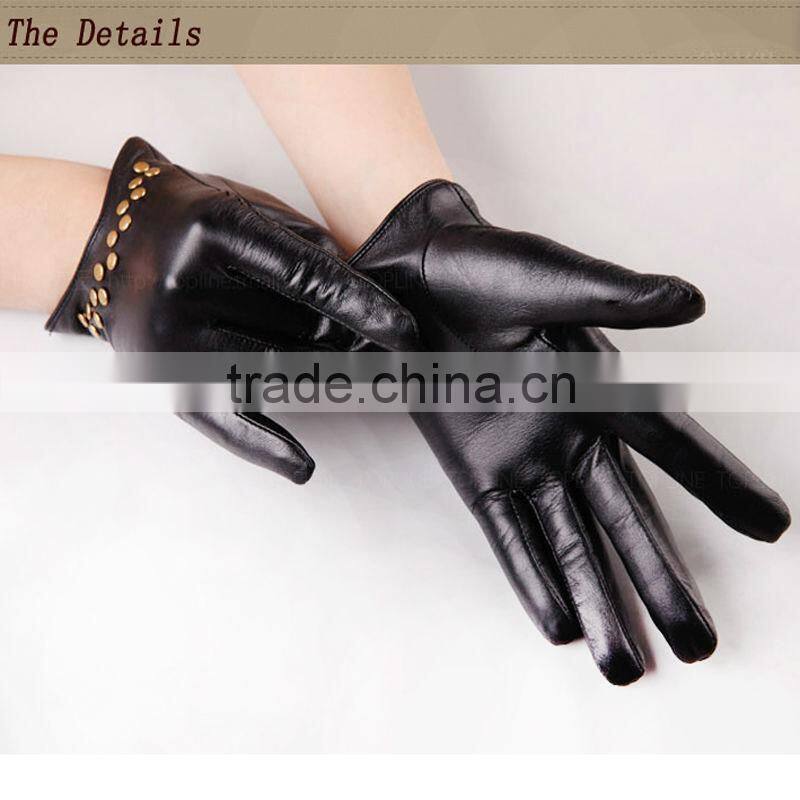 women wearing black and wet blue fashion leather driving gloves
