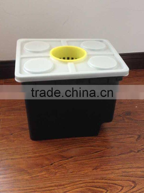 black hydroponic Dutch Buckets with lids