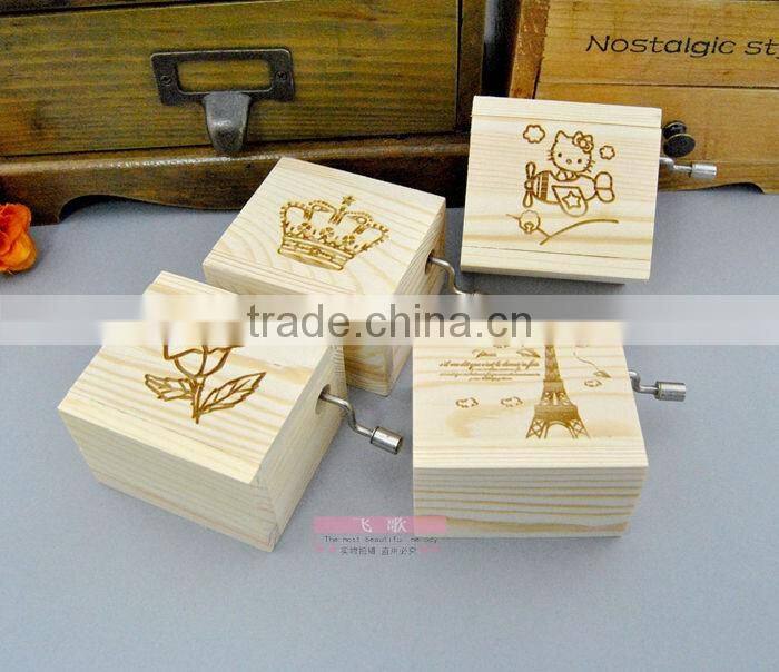 Natural wood color rotating music box